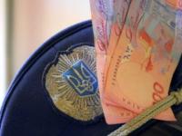При  отриманні неправомірної вигоди у сумі 3 тисяч гривень затримано оперуповноваженого одного з районних відділів поліції